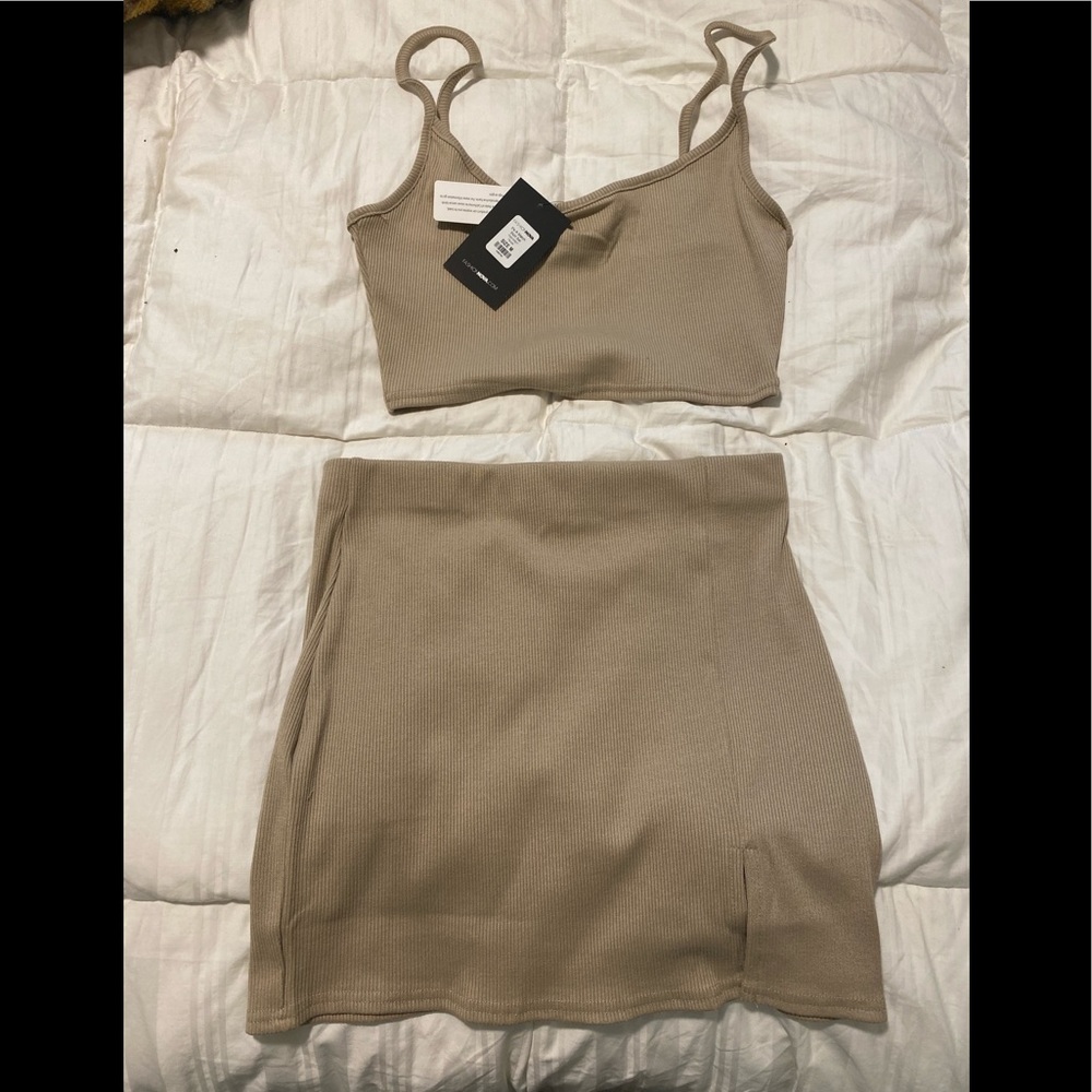 Two piece, nude set. NEVER WORN. Got wrong size